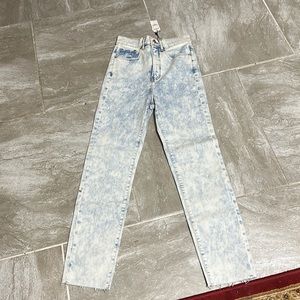 A pair of white and blue light wash jeans from Express. Never worn.